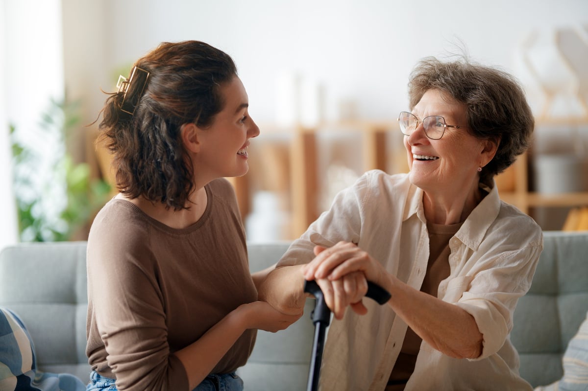 Happy patient and caregiver spending time together